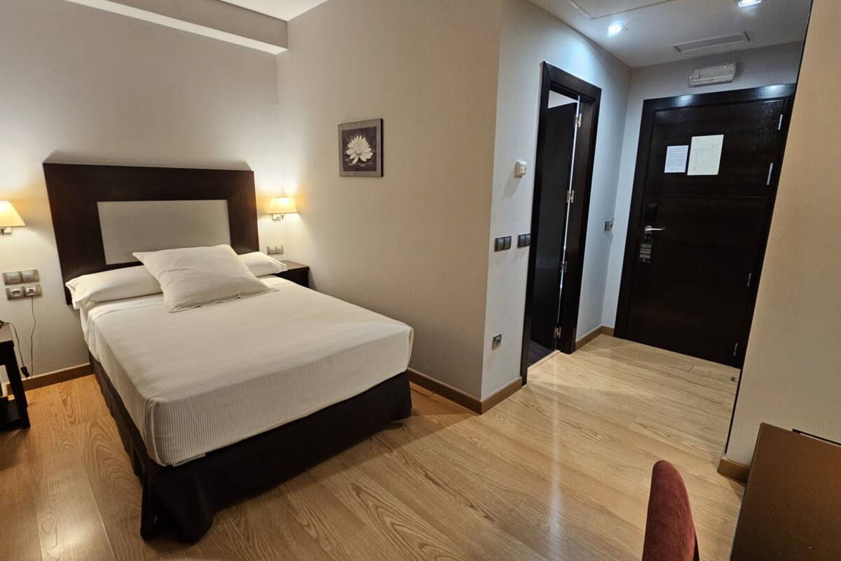 premium bedding, down duvets, memory-foam beds, minibar