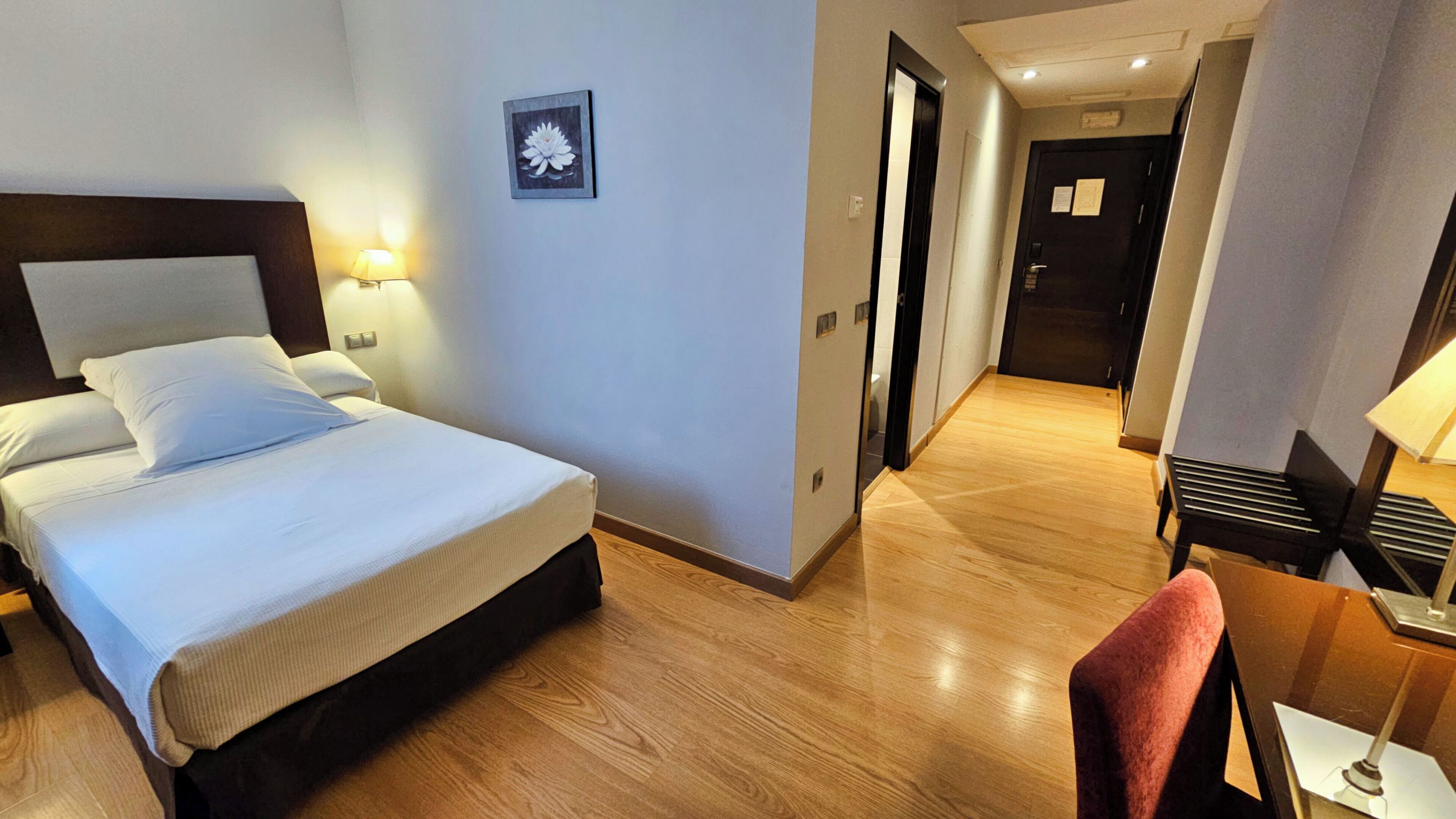 single room | premium bedding, down duvets, memory-foam beds, minibar
