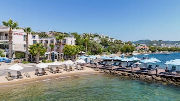 Private beach, sun loungers, beach towels