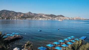 Private beach, sun loungers, beach towels