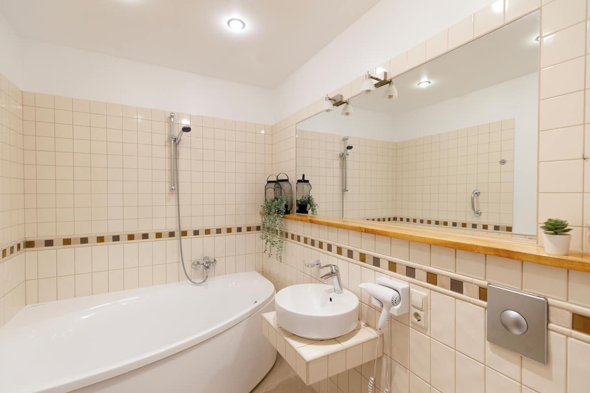 luxury suite | bathroom | hair dryer, towels, soap, shampoo