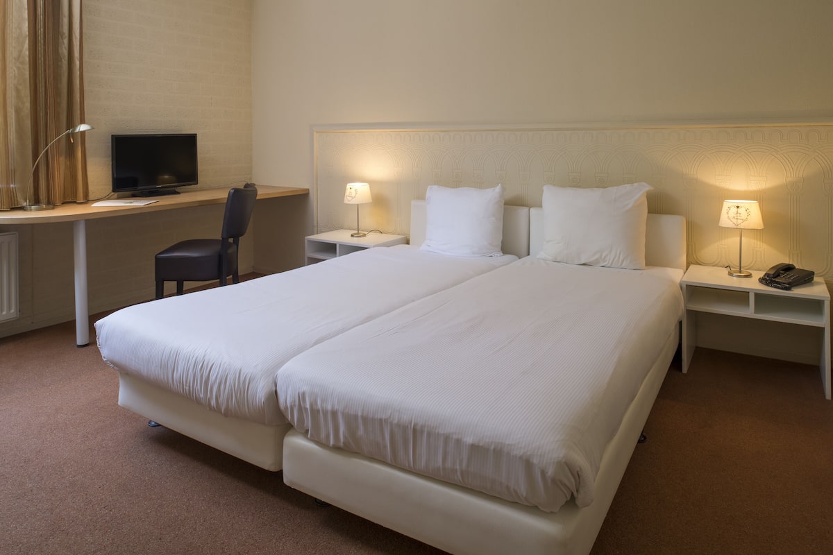 1 bedroom, pillow-top beds, individually furnished, desk