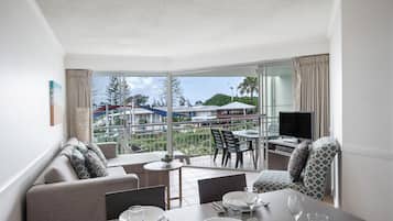 Three Bedroom Apartment | Living area | Flat-screen TV, DVD player, pay films