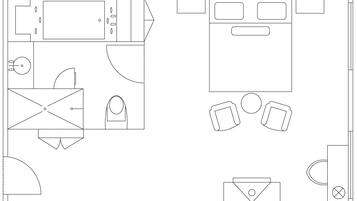 A floor plan with a kitchen area, dining space, and a bathroom.
