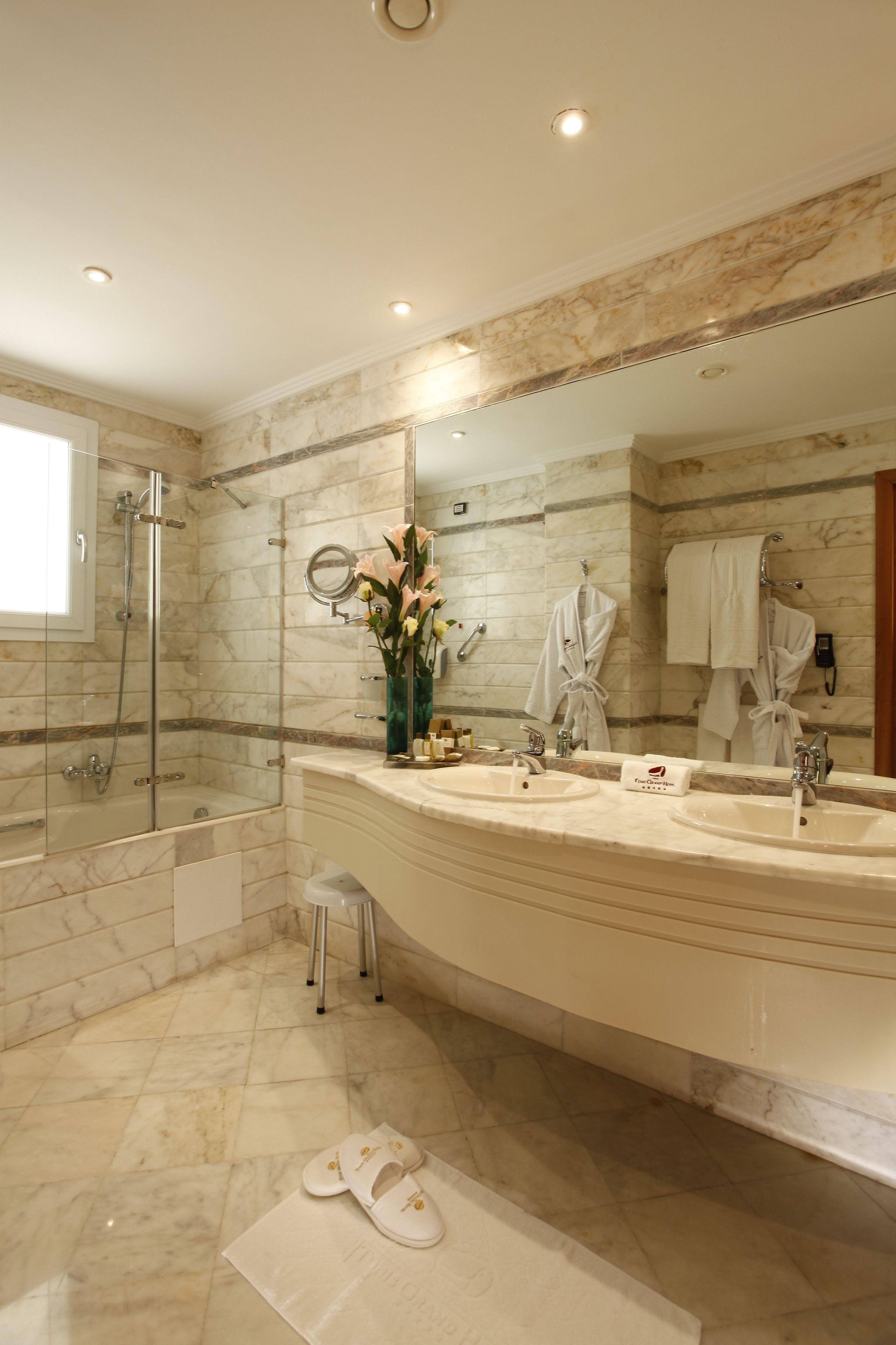 hair dryer, bathrobes, slippers, towels