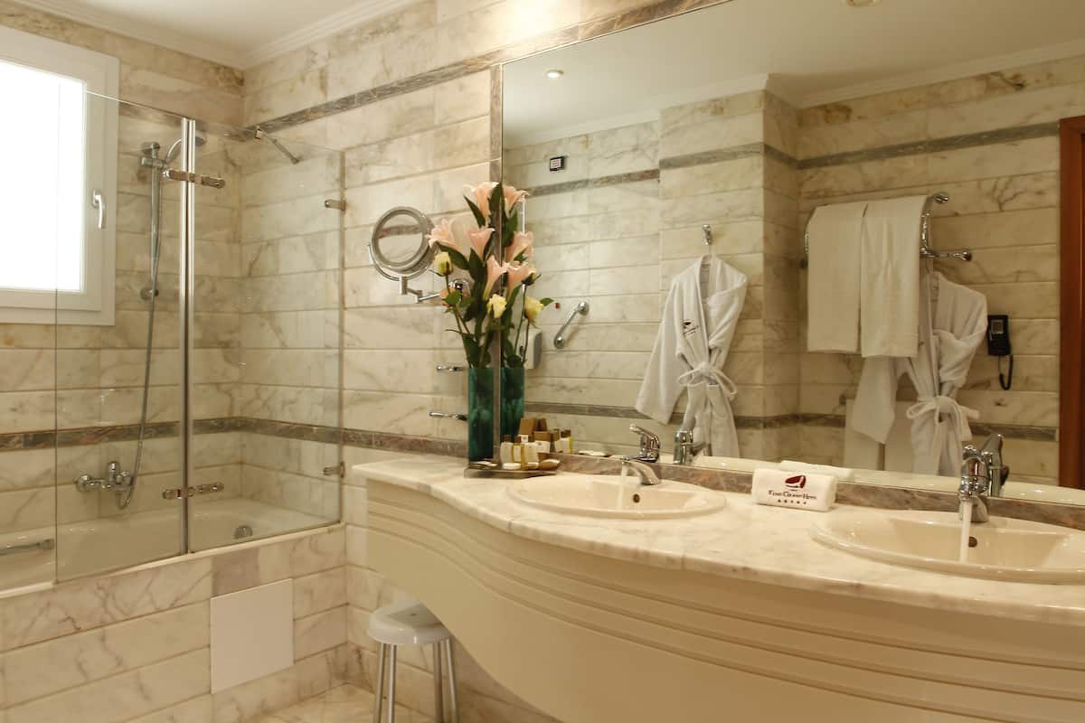 hair dryer, bathrobes, slippers, towels