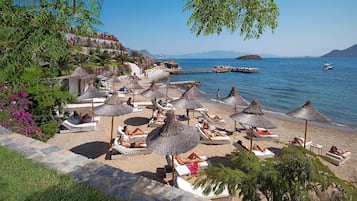 Private beach, beach cabanas, sun-loungers, beach umbrellas