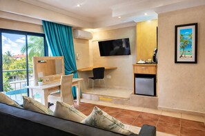 Suite Deluxe, 1 cama Queen size | Ropa de cama de alta calidad y camas Tempur-Pedic 