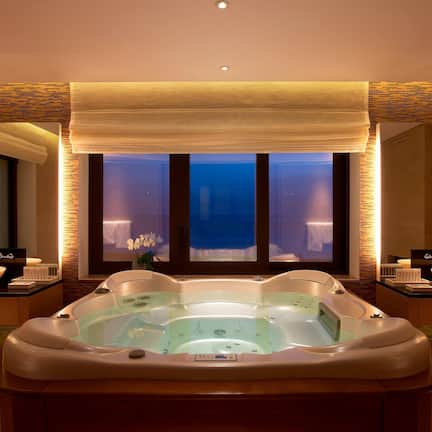 Separate tub and shower, rainfall showerhead, eco-friendly toiletries