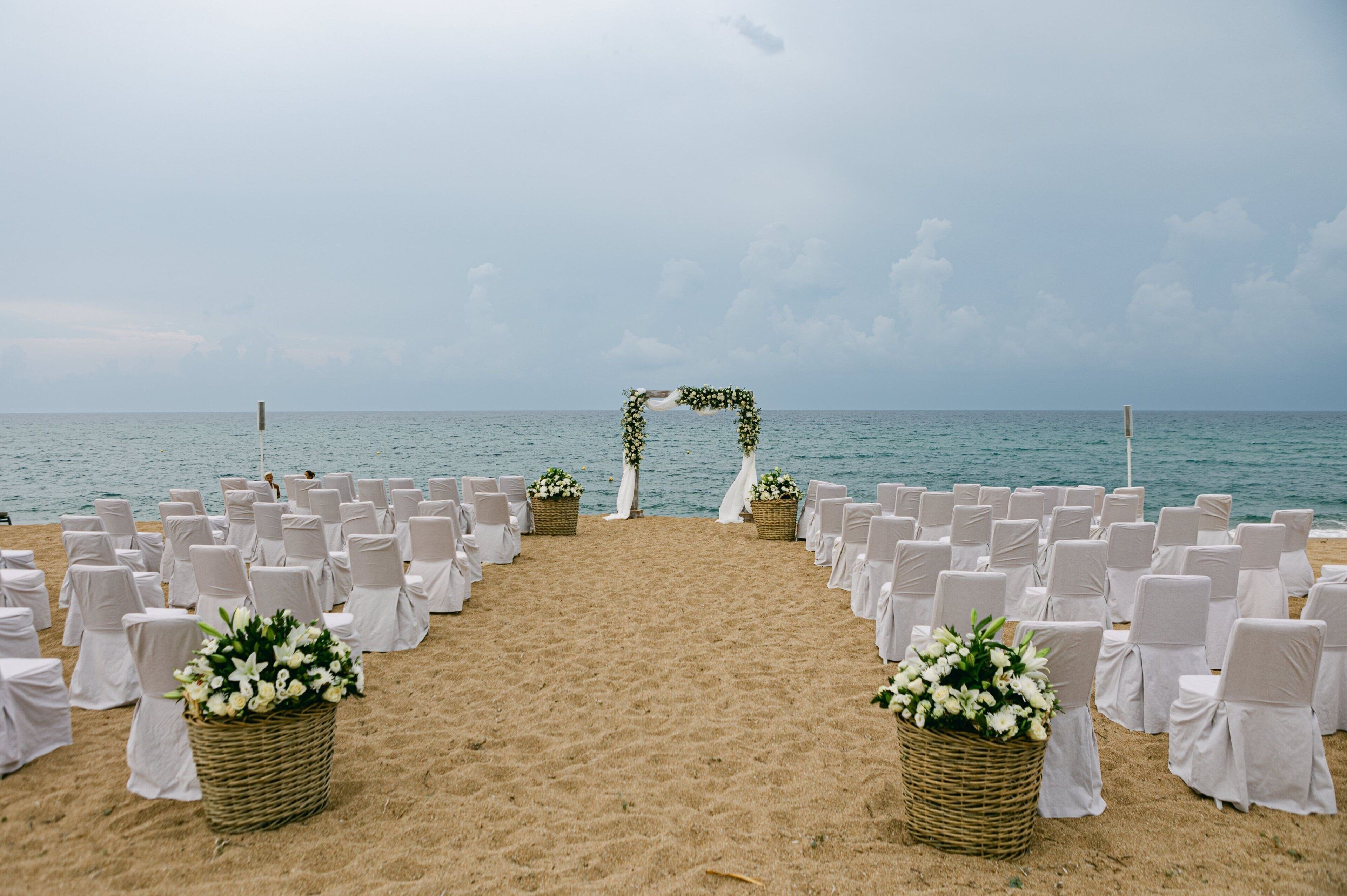 on the beach, sun-loungers, beach umbrellas, beach towels