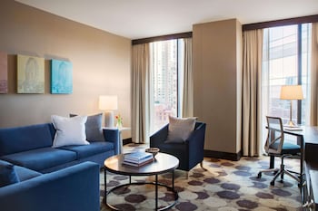 Suite, 1 Bedroom (Spa Suite) | In-room safe, individually decorated, individually furnished, desk at The Royal Sonesta Chicago River North