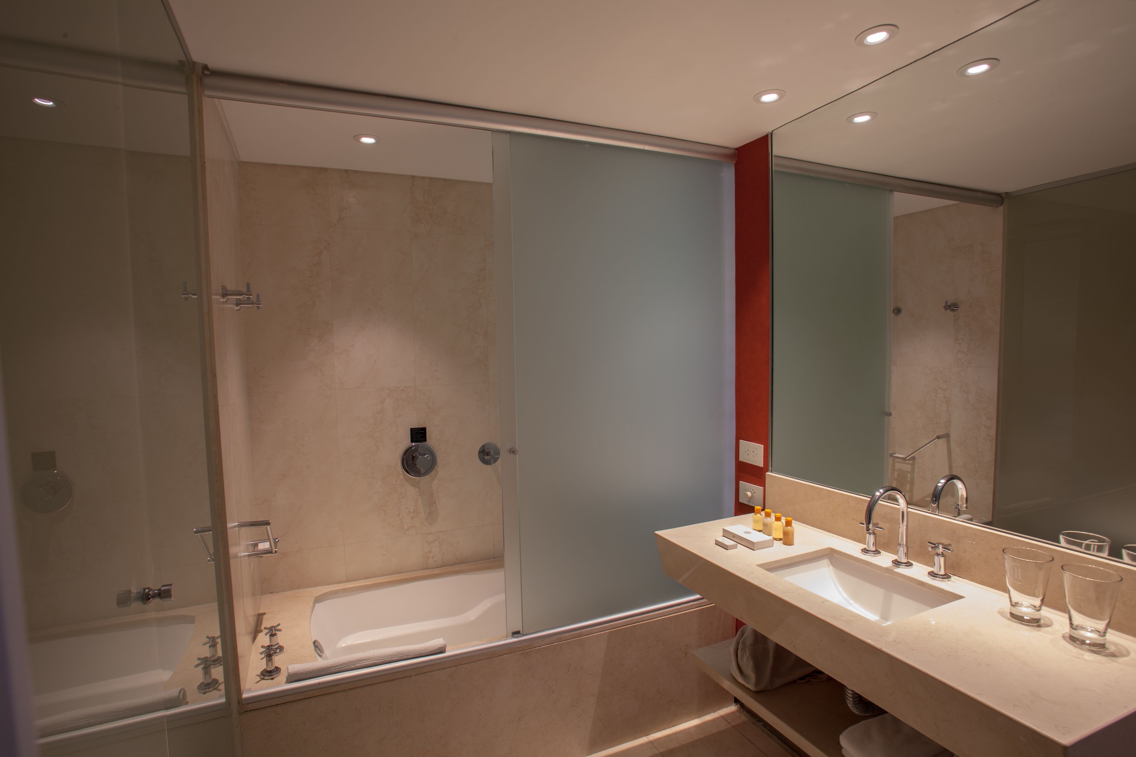 bathtub, rainfall showerhead, free toiletries, hair dryer