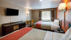 A hotel room with two beds, a TV, a desk, and a chair. - Motel 6 Rossford, OH (Rossford)