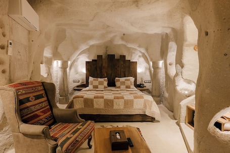 Suite with Private Pool | Premium bedding, minibar, in-room safe, individually decorated. Cappadocia Cave Suites