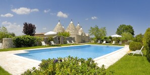 Outdoor pool, open 7:30 AM to 8:00 PM, pool loungers