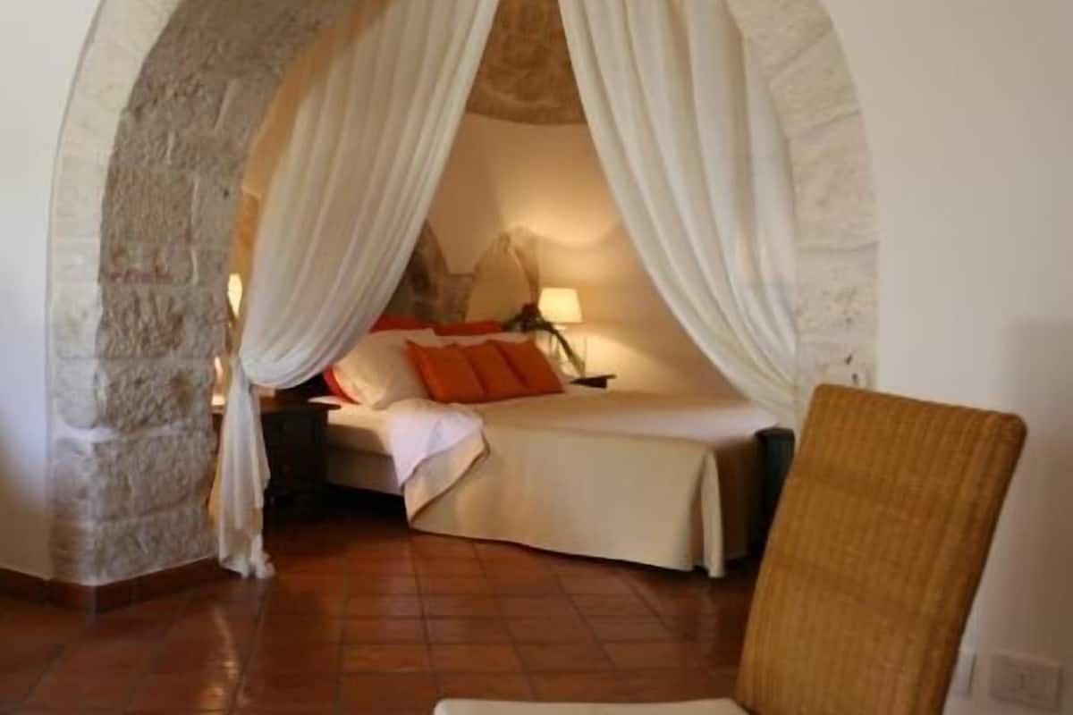 junior suite, 1 double bed (trullo) | premium bedding, minibar, in-room safe, desk