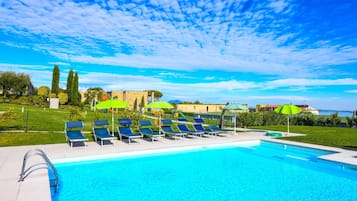 2 outdoor pools, open 9:00 AM to 7:30 PM, pool umbrellas, pool loungers