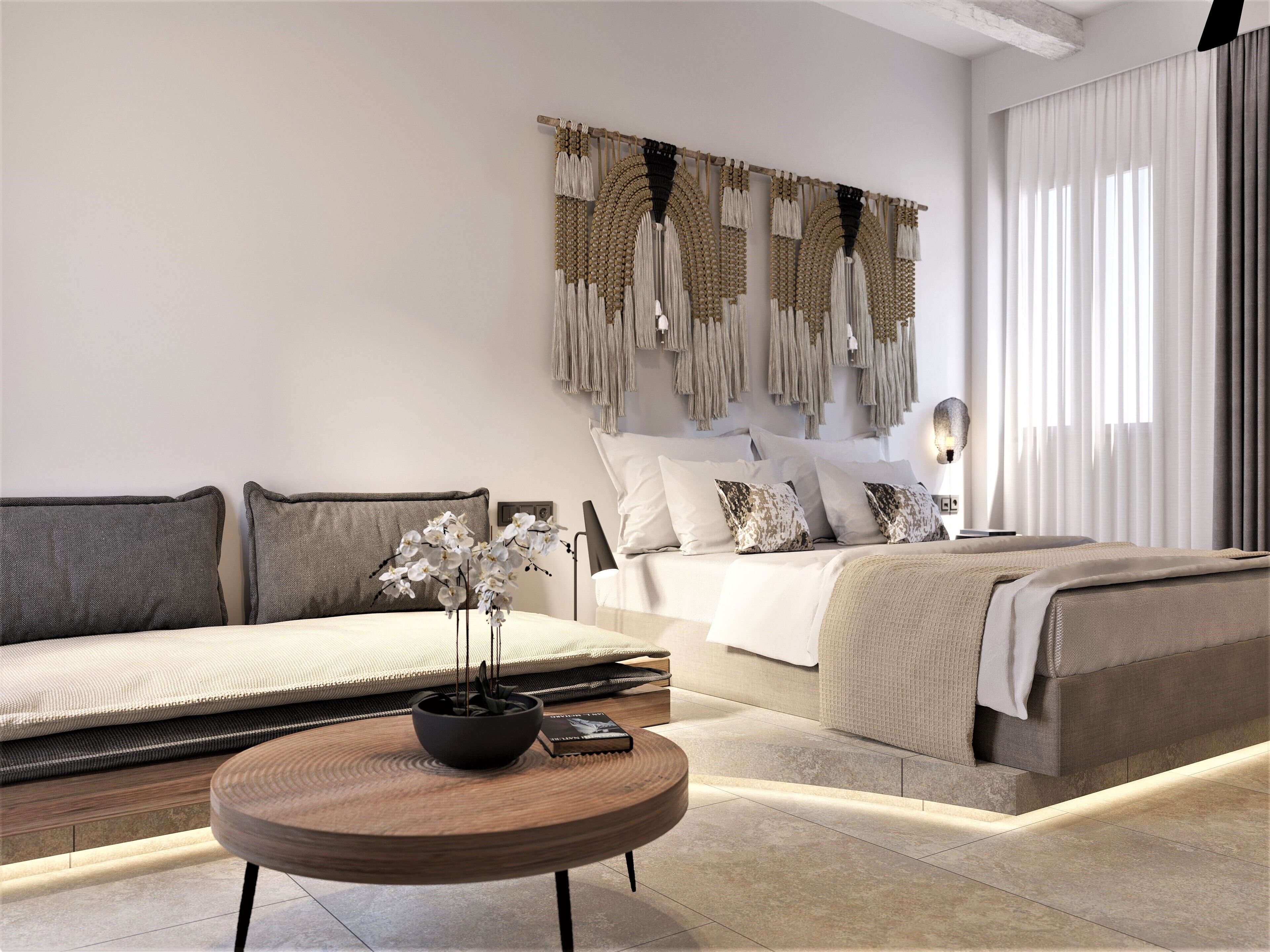 A modern bedroom with a large bed, a bedside table with a plant, and a wall-mounted macrame piece.