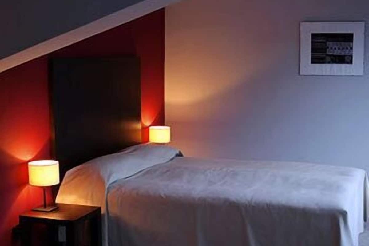 Chambre simple | Coffre-fort, bureau, rideaux d’obscurcissement, système d’insonorisation