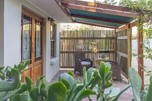 Family Room, Garden View | Terrace/patio