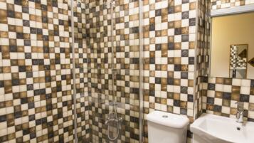 Economy Shared Dormitory, Women only | Bathroom | Shower, hair dryer, towels