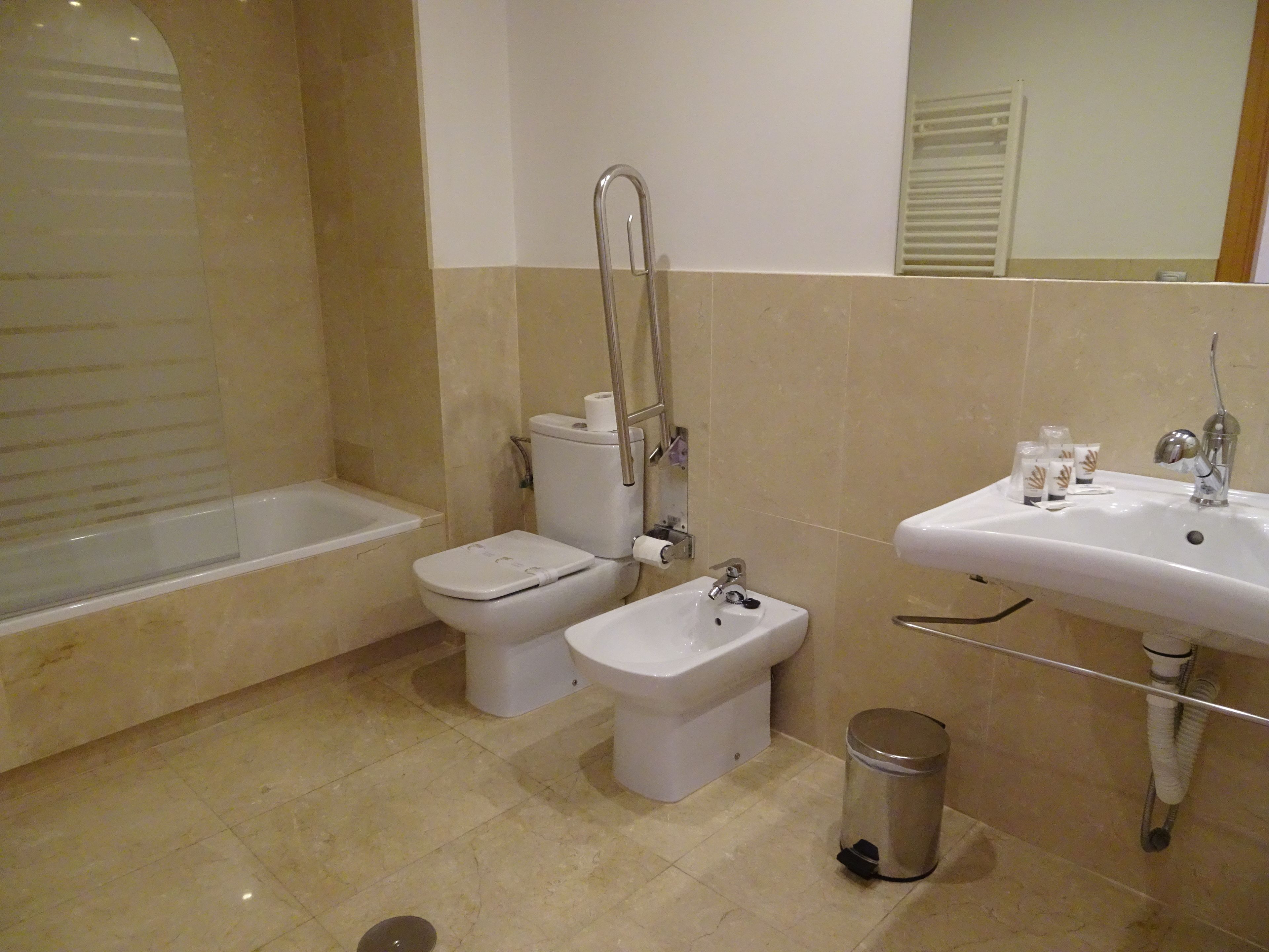 basic triple room, 1 bedroom, accessible, partial sea view | bathroom | bathtub, free toiletries, hair dryer, bidet
