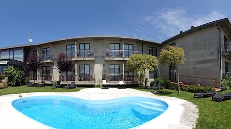 Seasonal outdoor pool. Peregrina