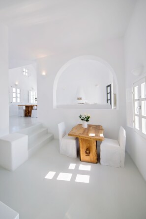 Villa (Marily) | Living area | 28-inch flat-screen TV with cable channels, TV - Aenaon Villas (Santorini)