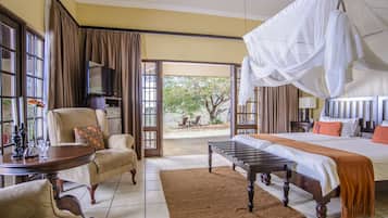 Luxury Room | Minibar, in-room safe, desk, iron/ironing board