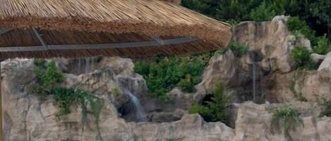 Seasonal outdoor pool, open 9:00 AM to 8:00 PM, pool umbrellas