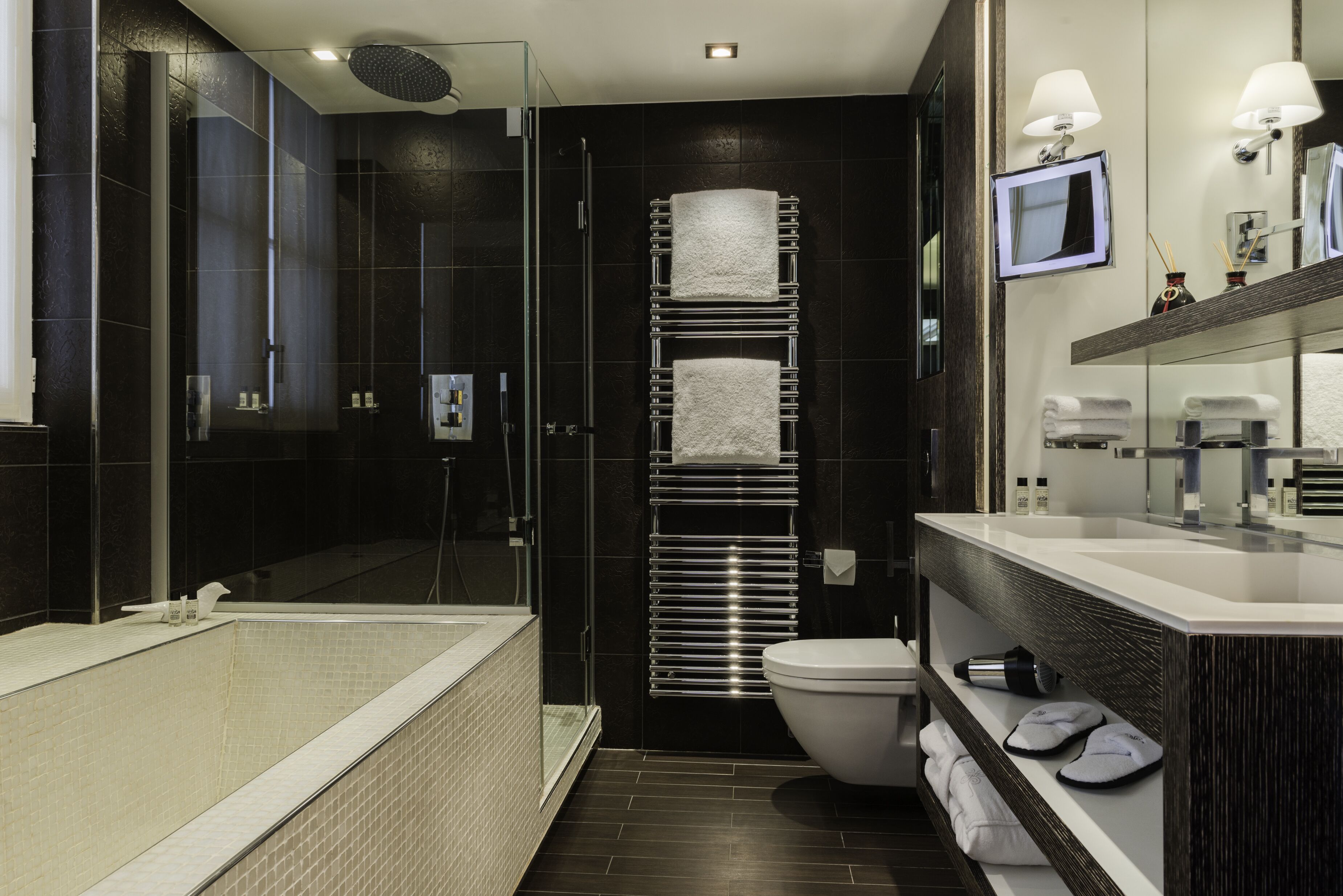 designer toiletries, hair dryer, bathrobes, slippers