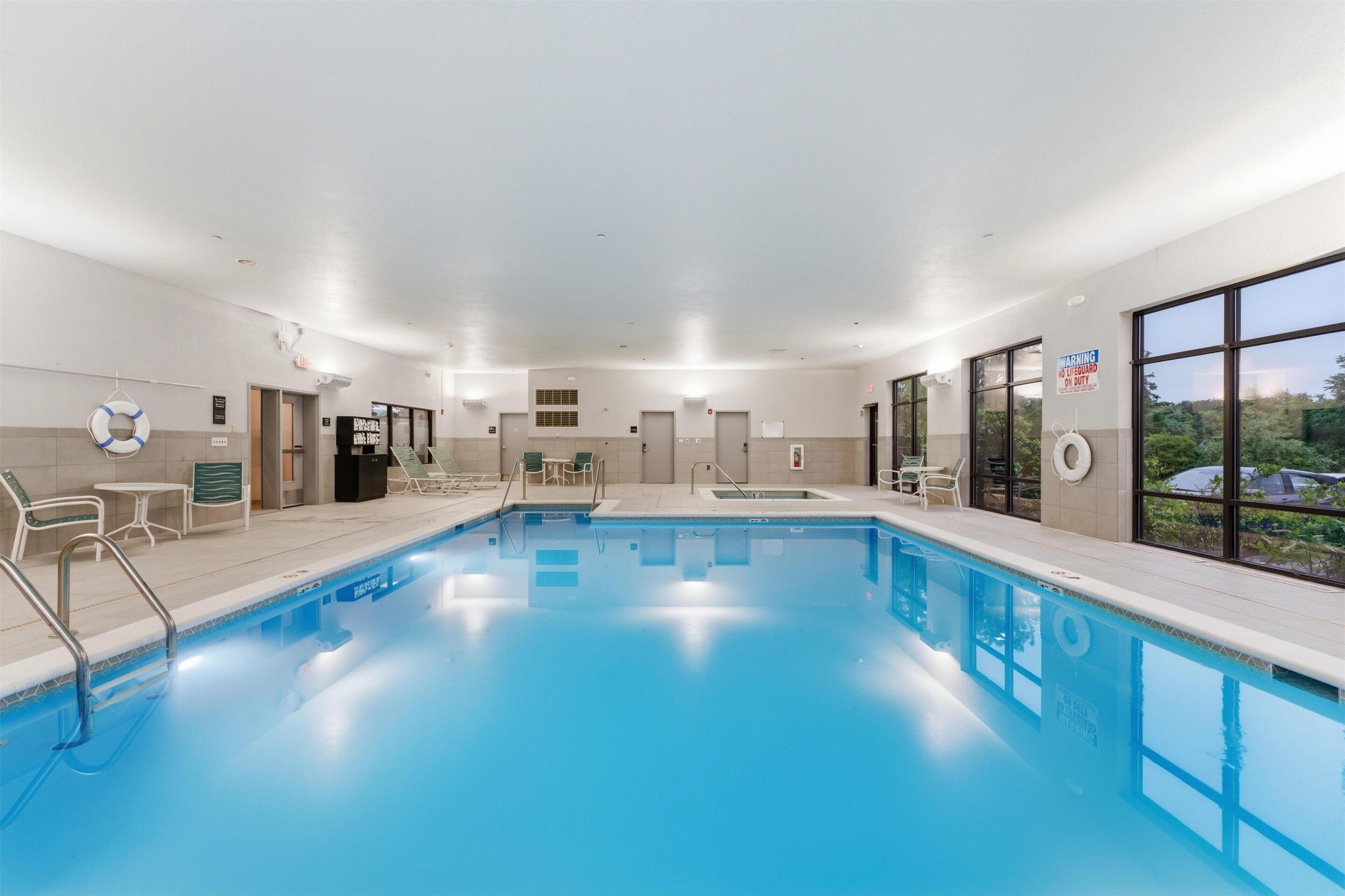 Indoor pool, open 8 AM to 10 PM, pool loungers