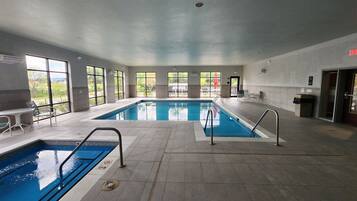 Indoor pool, open 8 AM to 10 PM, pool loungers