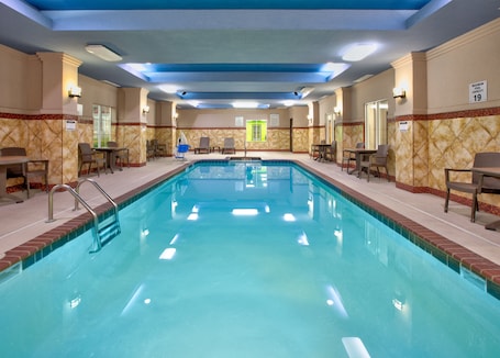 Indoor pool, open 10:00 AM to 10:00 PM, pool loungers. La Quinta Inn & Suites by Wyndham Little Rock - Bryant