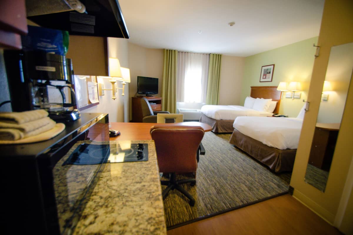 studio suite, 2 double beds | down duvets, individually furnished, desk, laptop workspace