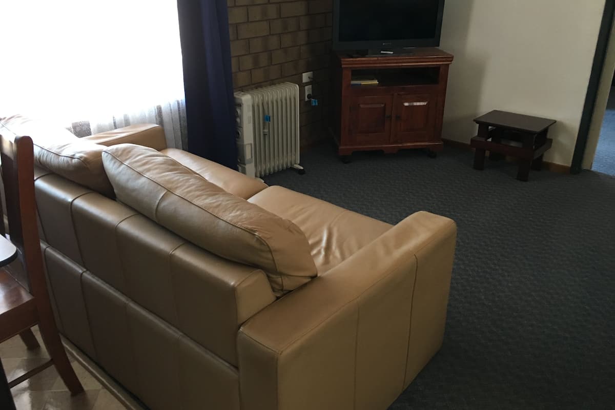 Family Unit, 2 Bedrooms | Living area | 40-cm TV with cable channels