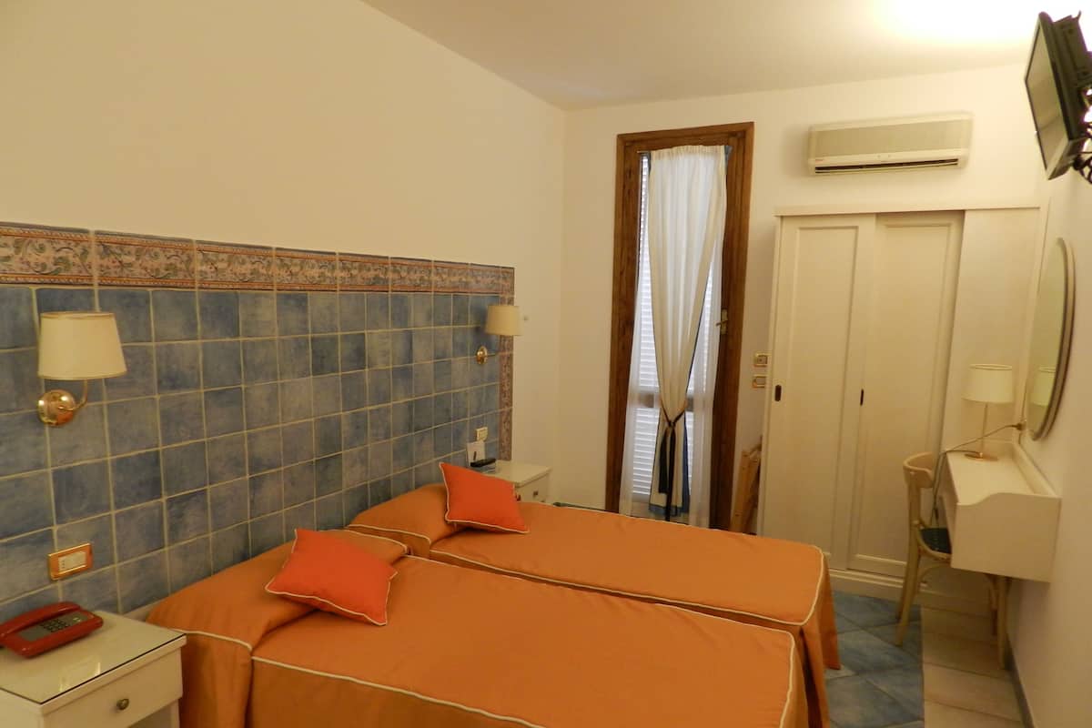 Standard Double Room, 2 Single Beds | In-room safe, desk, iron/ironing board, free cots/infant beds