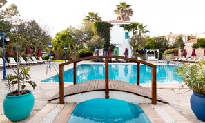 2 outdoor pools, pool umbrellas, pool loungers