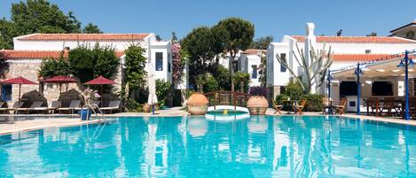 2 outdoor pools, pool umbrellas, pool loungers