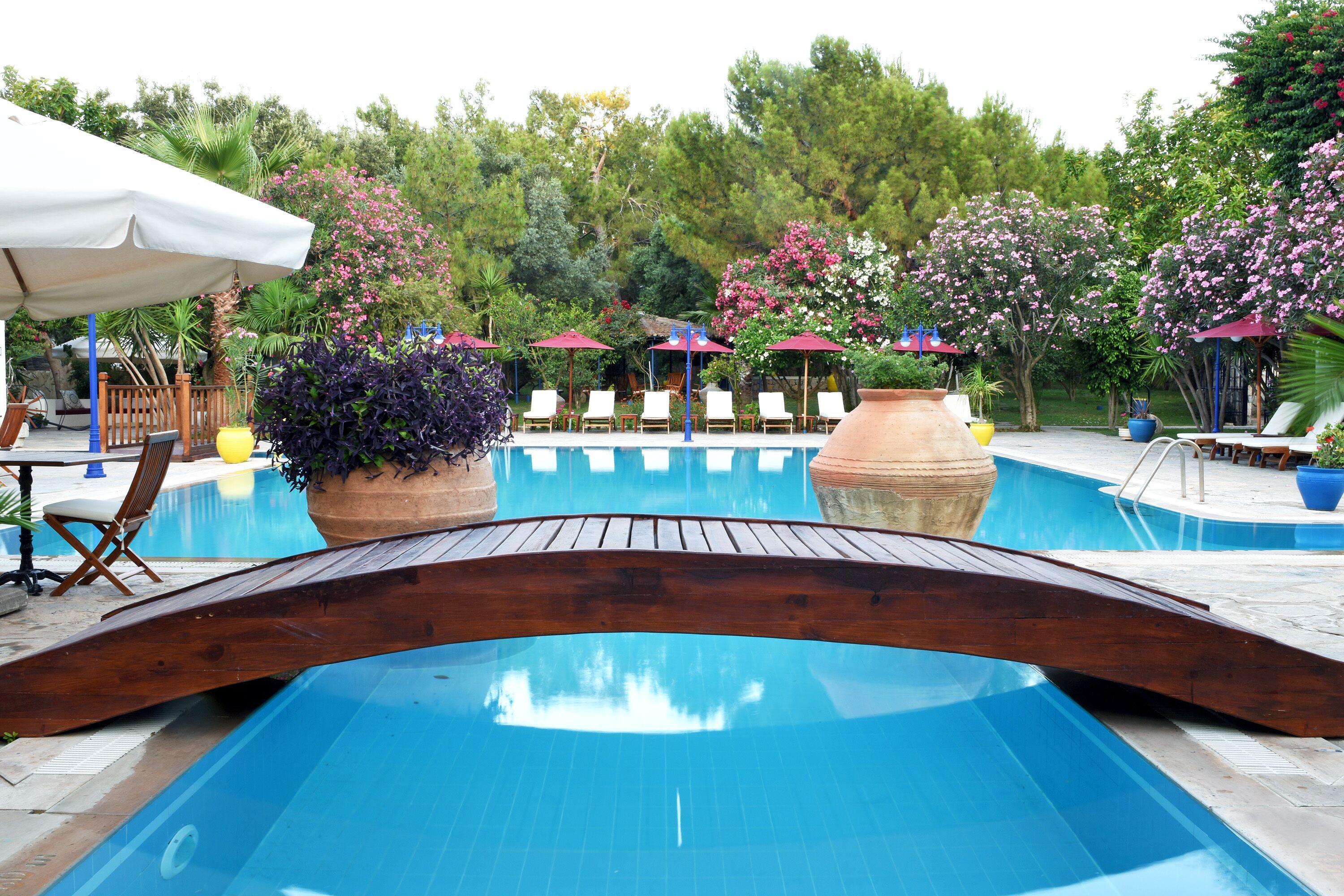 2 outdoor pools, pool umbrellas, pool loungers