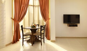 42-inch flat-screen TV with satellite channels, TV