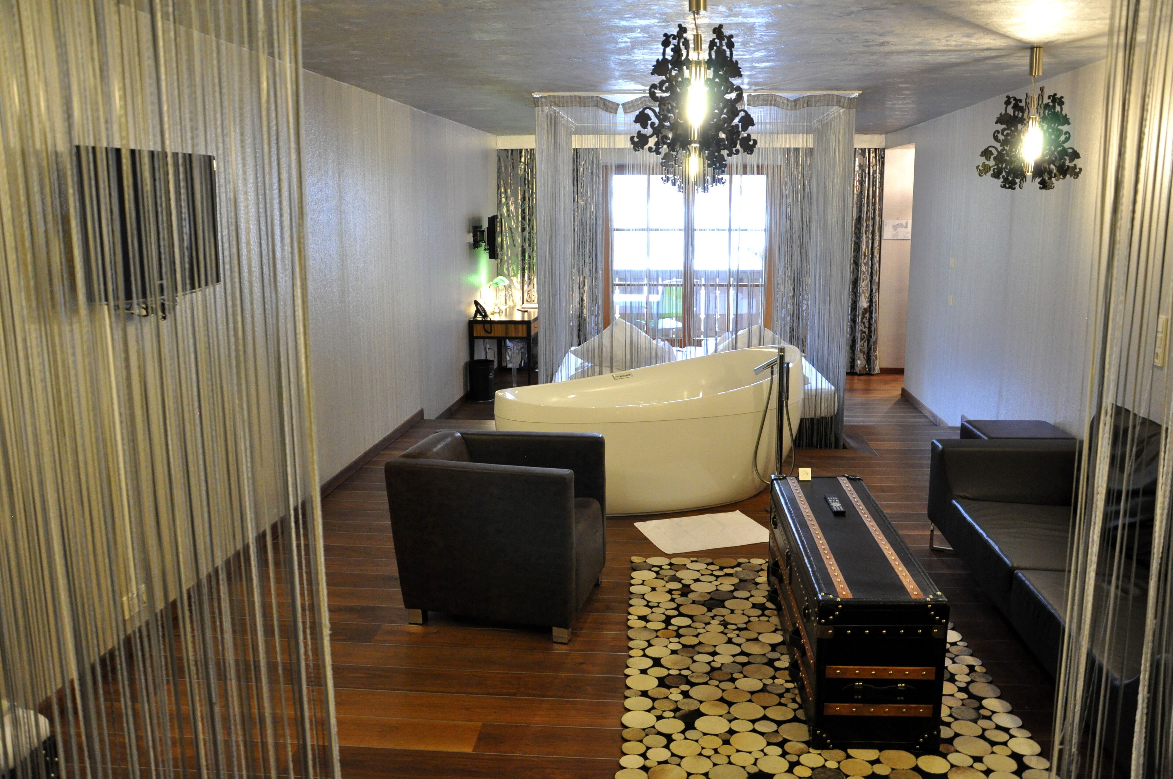 signature studio, 1 double bed, courtyard view | living area | tv, pay films