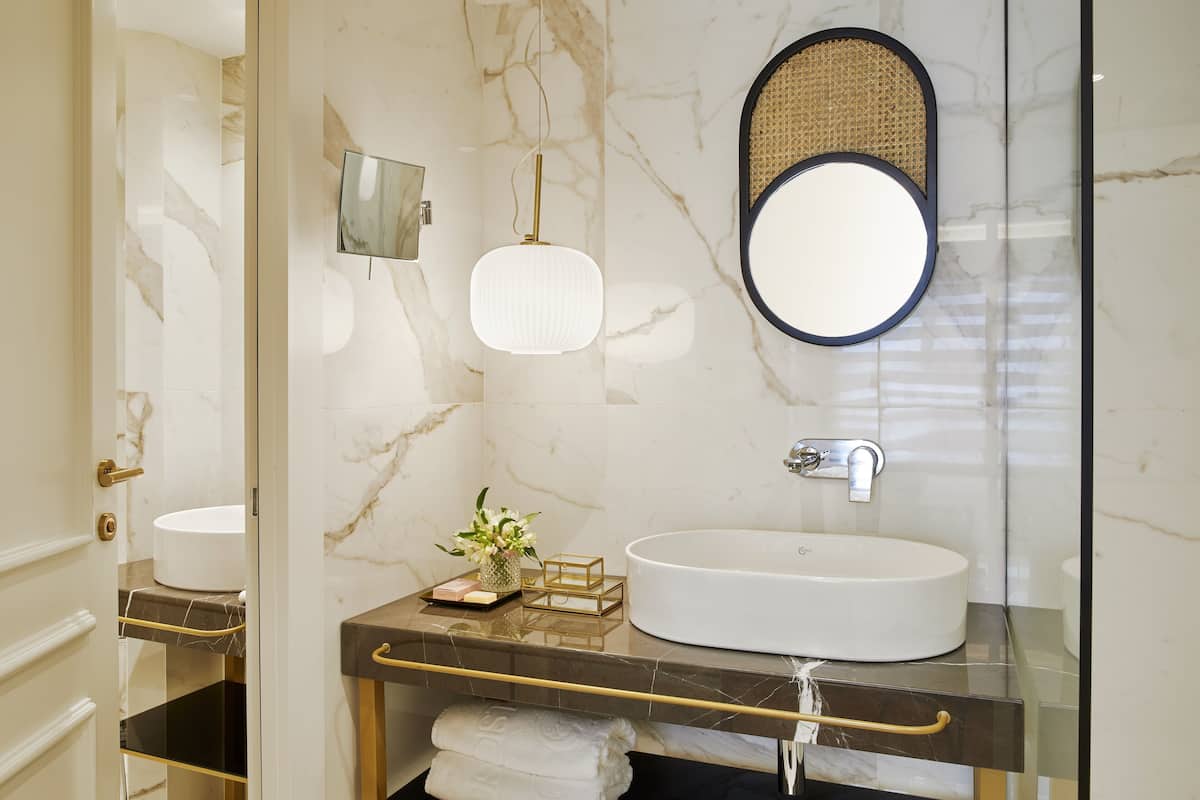 deluxe suite (penthouse) | bathroom | designer toiletries, hair dryer, bathrobes, slippers