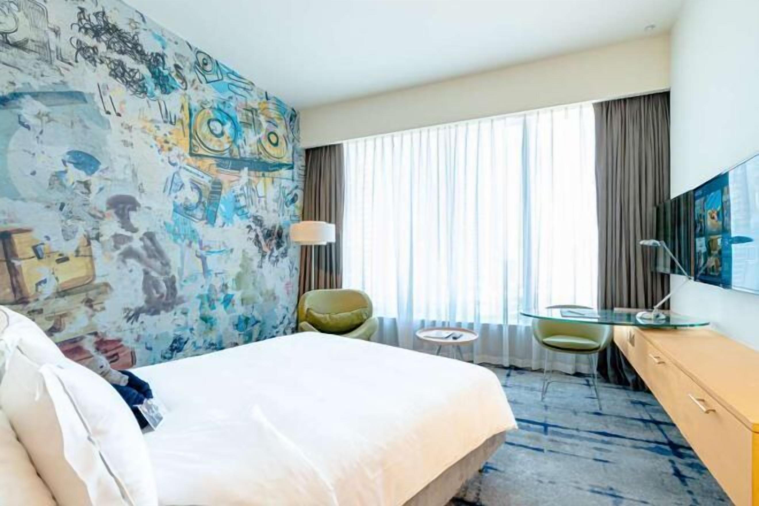 Premium bedding, down duvets, Select Comfort beds, minibar