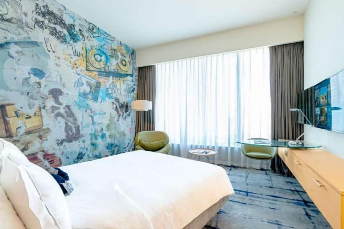 Premium bedding, down duvets, Select Comfort beds, minibar