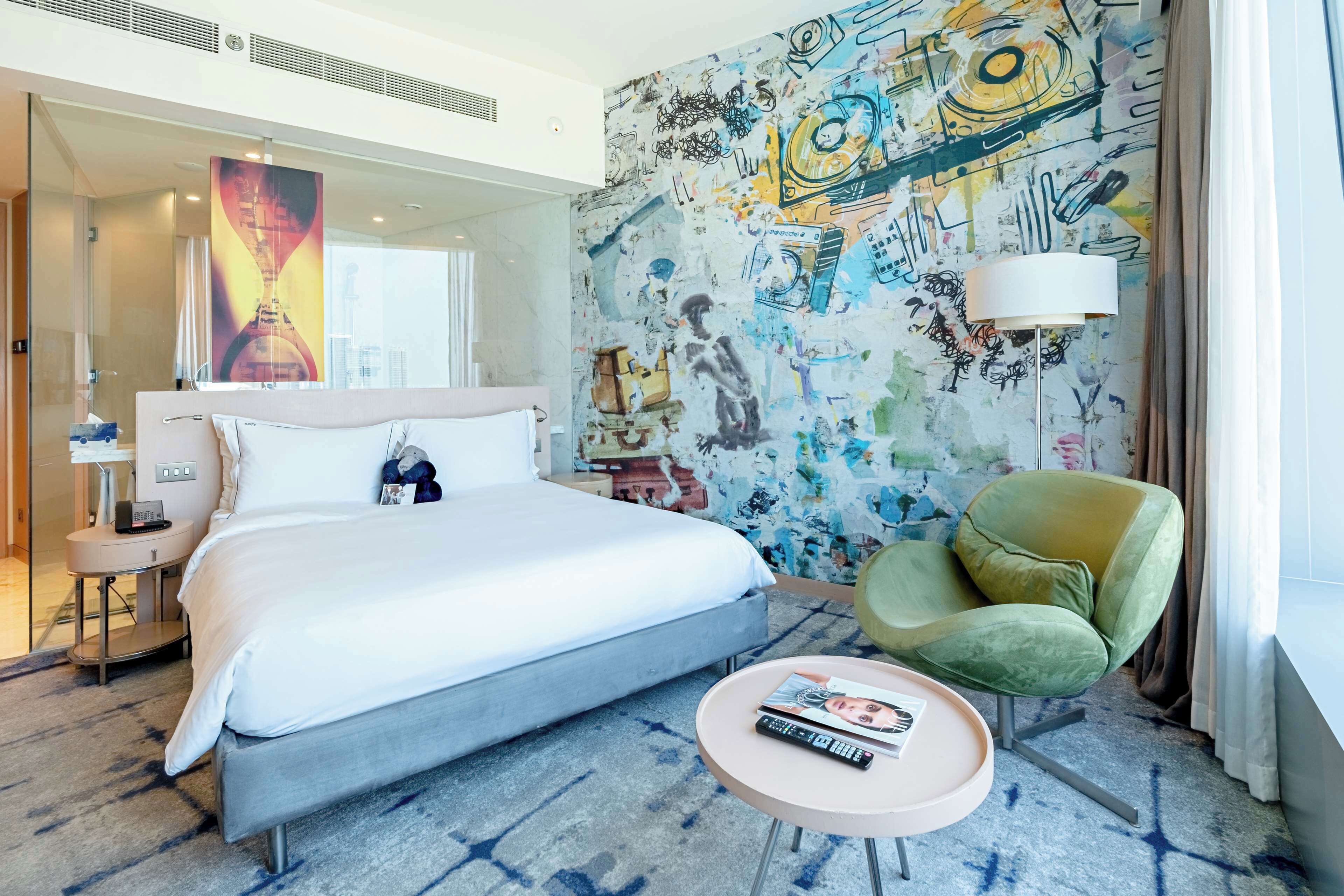 Premium bedding, down comforters, Select Comfort beds, minibar