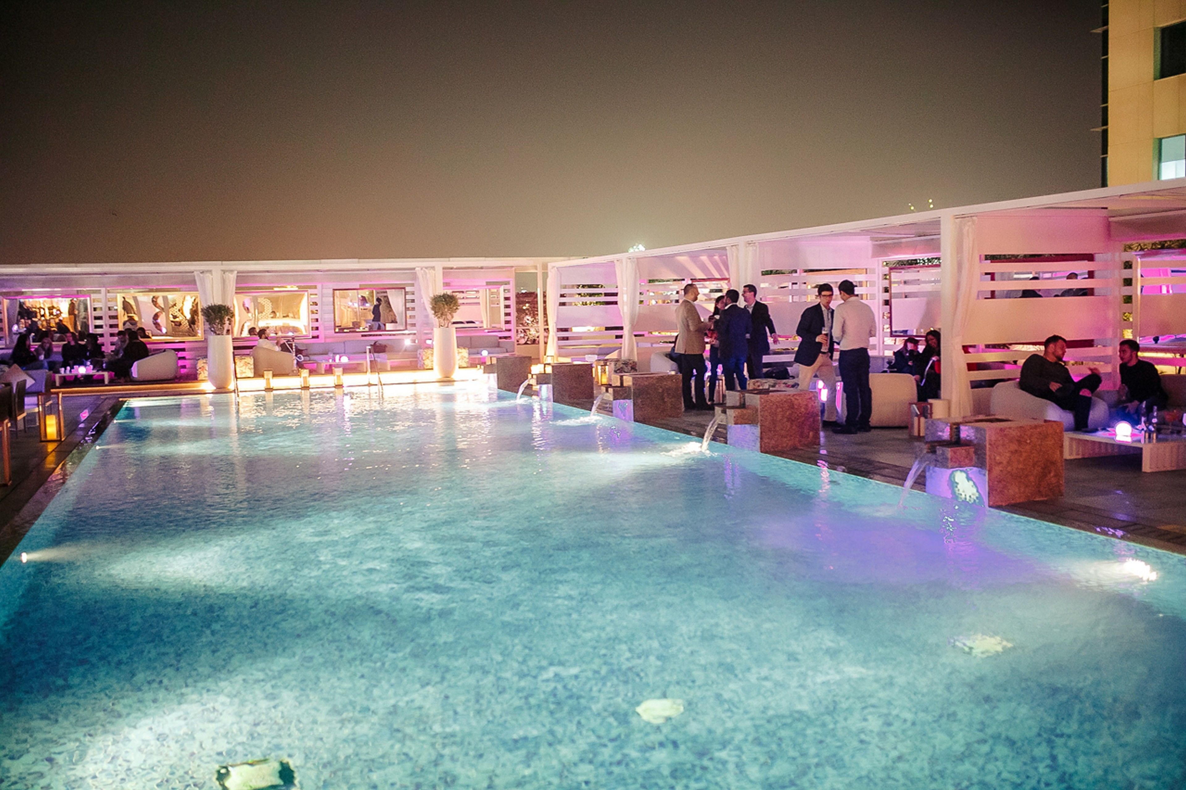 Outdoor pool, free pool cabanas, pool umbrellas