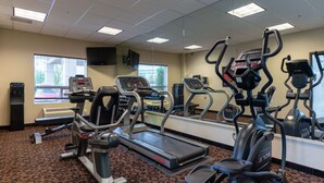 A gym with treadmills, elliptical machines, and a stationary bike. - Best Western Plus South Edmonton Inn & Suites (Edmonton)