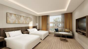 Deluxe Twin Room | Down comforters, in-room safe, individually decorated