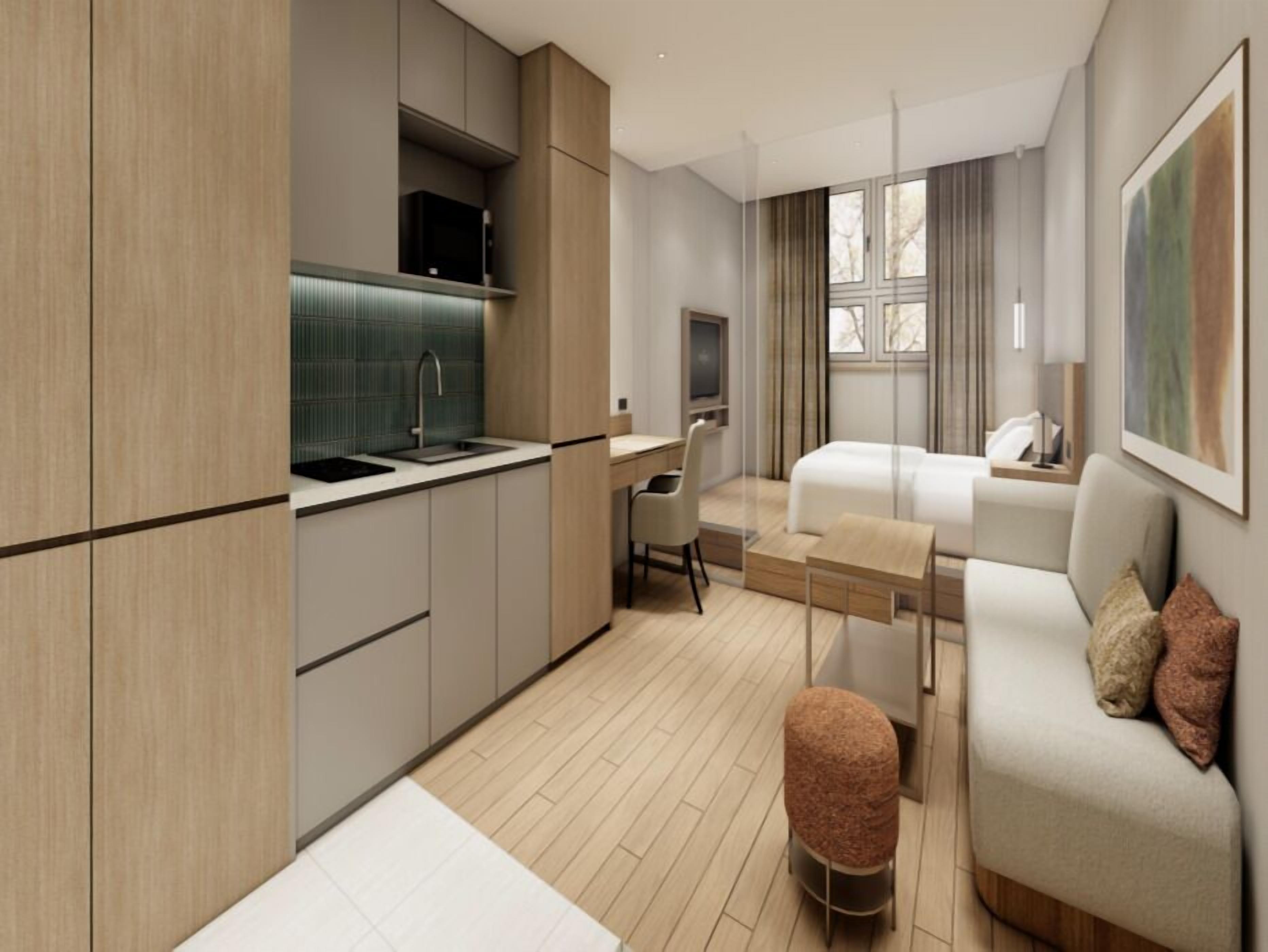 Habitación empresarial doble, 1 cama matrimonial | Edredón, caja de seguridad en la habitación y decoración personalizada 